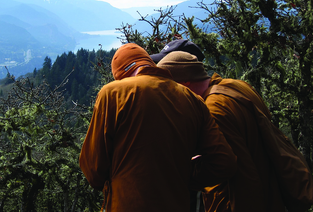 3 monks discussing winter planning